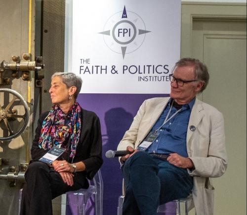 Penn State professor Lori Ginzberg and Yale University professor David Blight listen during a Faith & Politics panel in Geneva, N.Y., on July 21. (Chantale Wong/Faith & Politics Institute)