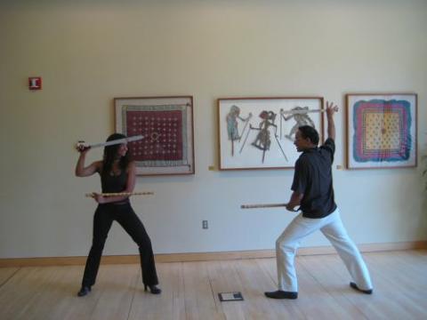 T.J. Desch Obi and guest practicing the art of machete