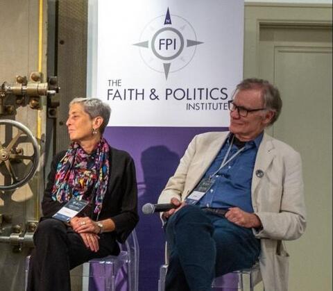 Penn State professor Lori Ginzberg and Yale University professor David Blight listen during a Faith & Politics panel in Geneva, N.Y., on July 21. (Chantale Wong/Faith & Politics Institute)